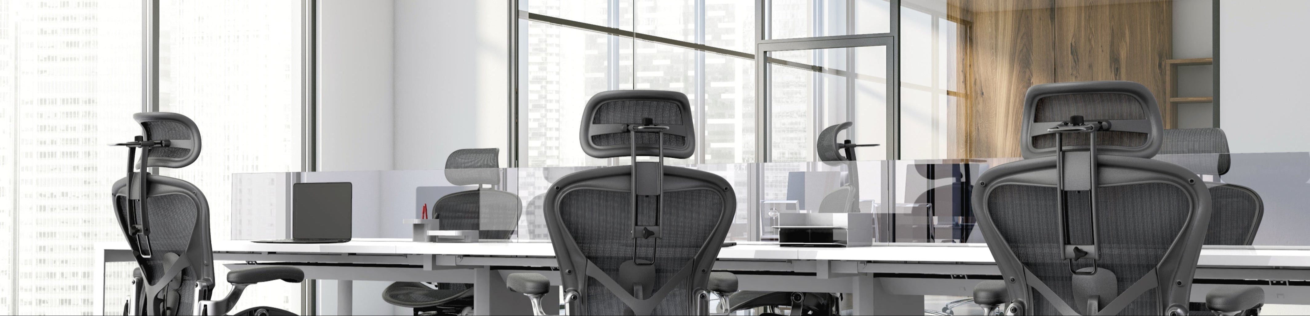 Office space with Aeron Chairs fitted with Atlas Headrest